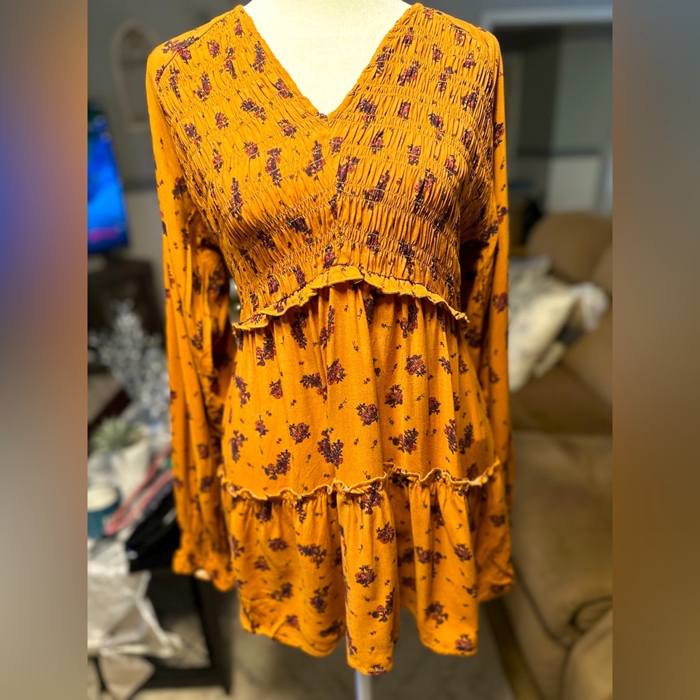 Dark mustard tunic style top. Size medium